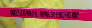 A red and black tape with the words " removal authorized personnel ".